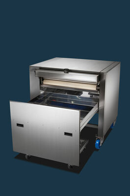 Anlagen- und Maschinenbau: Backblechputzmaschine 